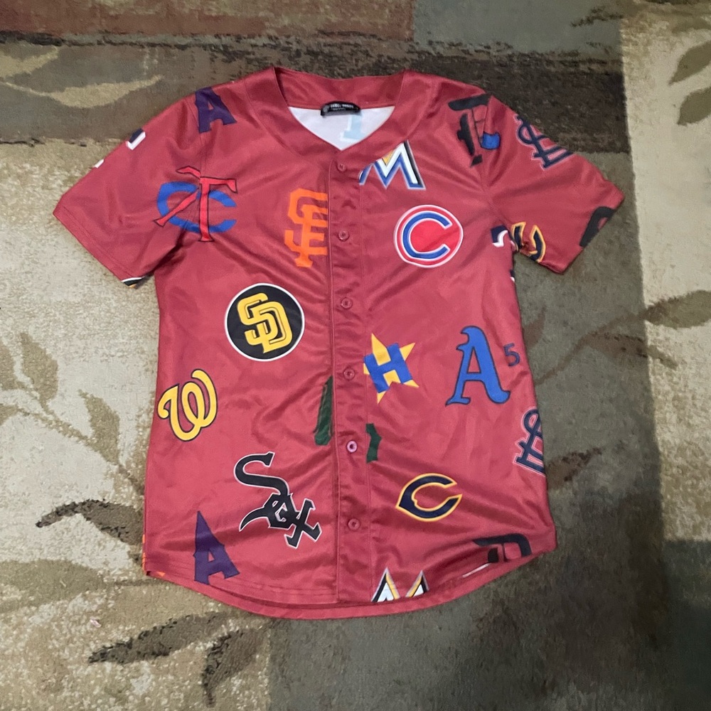 Vibrant Red Sports Jersey with Graphic Designs